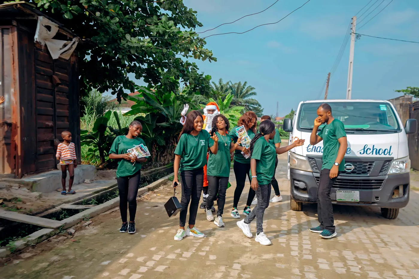 The Chasteville team and school bus on the Christmas visit